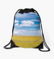 Yellow fields under blue cloudy sky Drawstring Bag