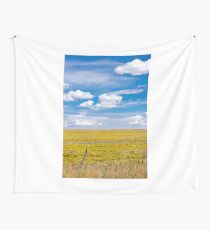 Yellow fields under blue cloudy sky Wall Tapestry