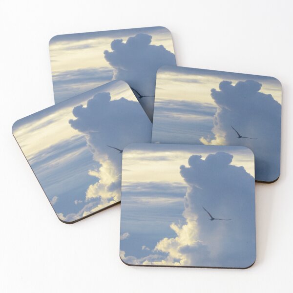 Item preview, Photograph of white clouds in a blue sky with a bird in silhouette. - WelshDesigns designed and sold by welshdesigns.