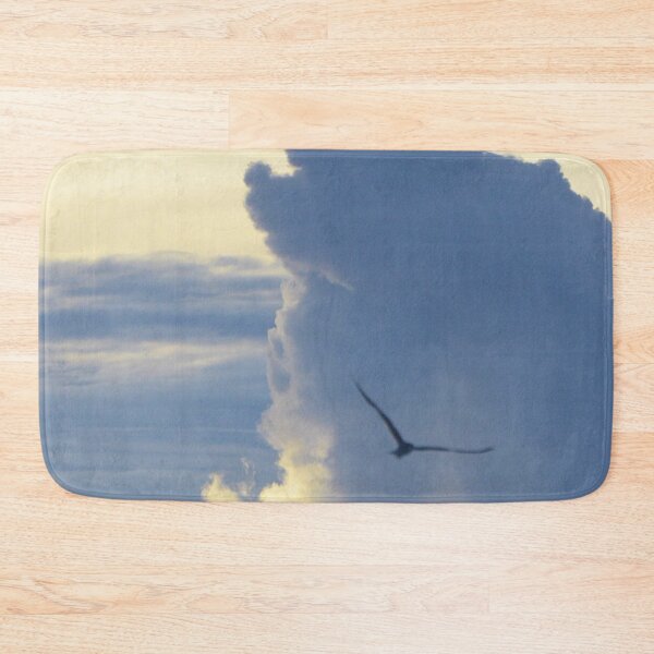 Item preview, Photograph of white clouds in a blue sky with a bird in silhouette. - WelshDesigns designed and sold by welshdesigns.