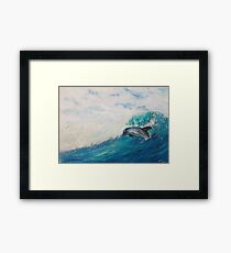Dolphin in waves turquoise Framed Print