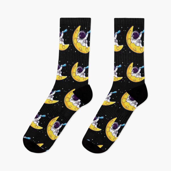 Item preview, Cute crescent moon and astronaut holding an telescope cartoon. designed and sold by BEAUTY ⭐⭐⭐⭐⭐.