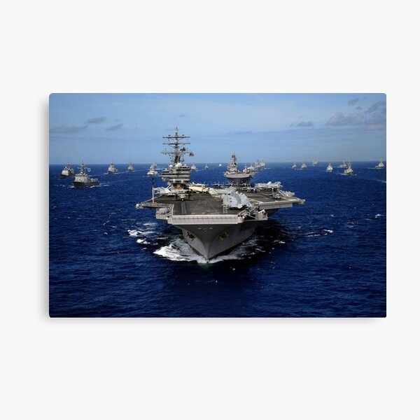 Item preview, STK103847M-Aircraft carrier USS Ronald Reagan leads a mass formation of ships through the Pacific Ocean. designed and sold by StocktrekImages.