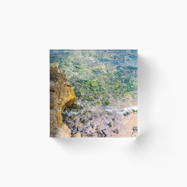 wave rolls onto the rocks of sandy coast Acrylic Block