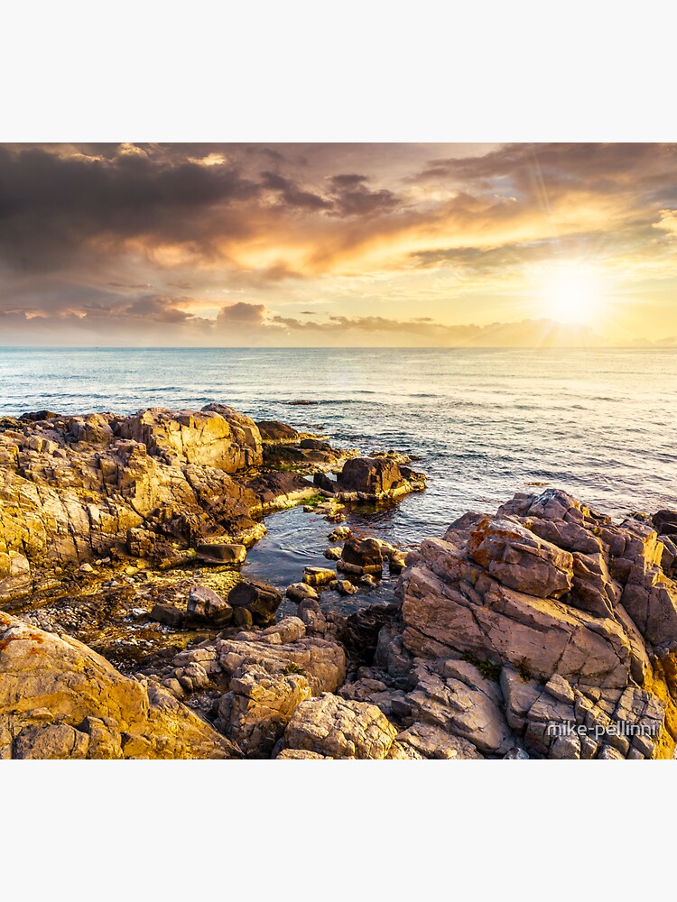 Thumbnail 3 of 3, Sticker, sea landscape on the rocky coast at sunset designed and sold by mike-pellinni.