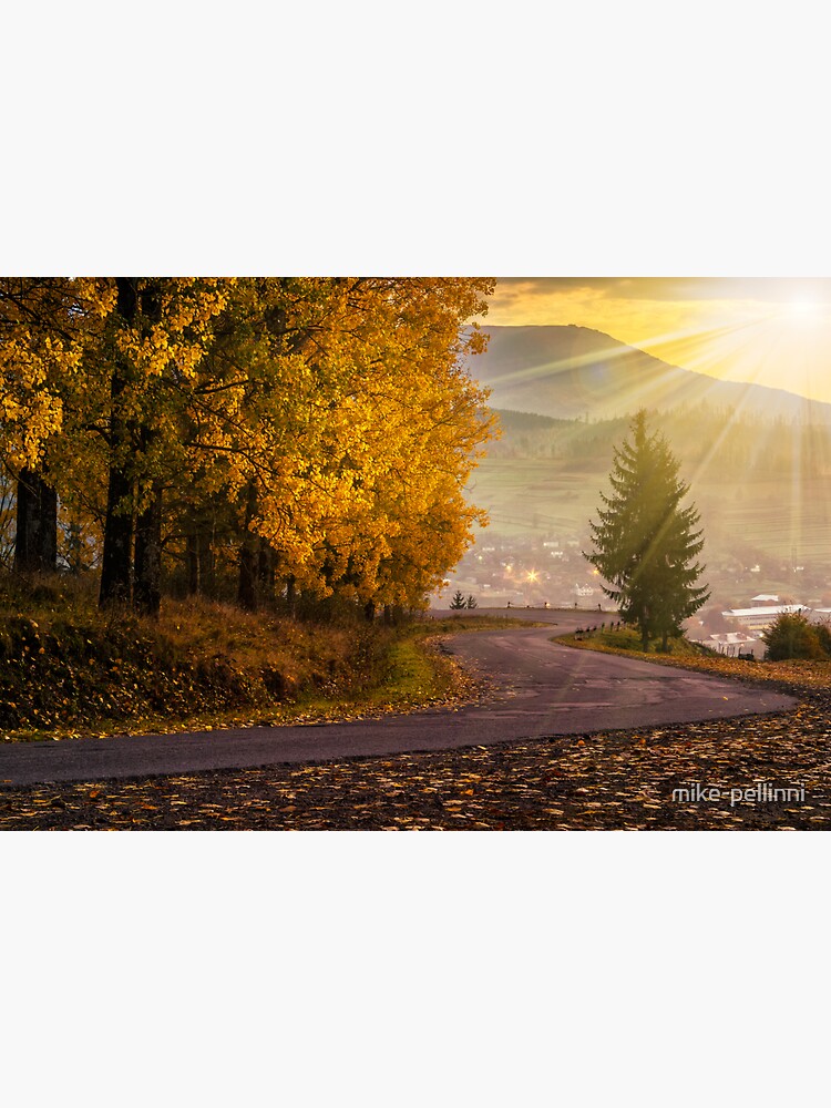 Thumbnail 3 of 3, Sticker, mountain road to village in mountains at sunset designed and sold by mike-pellinni.