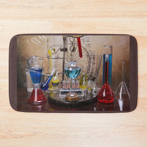 Item preview, Glasses and test tubes of alembic with nixie valves on the wooden table with year 2022 designed and sold by Cinzia Murgia.