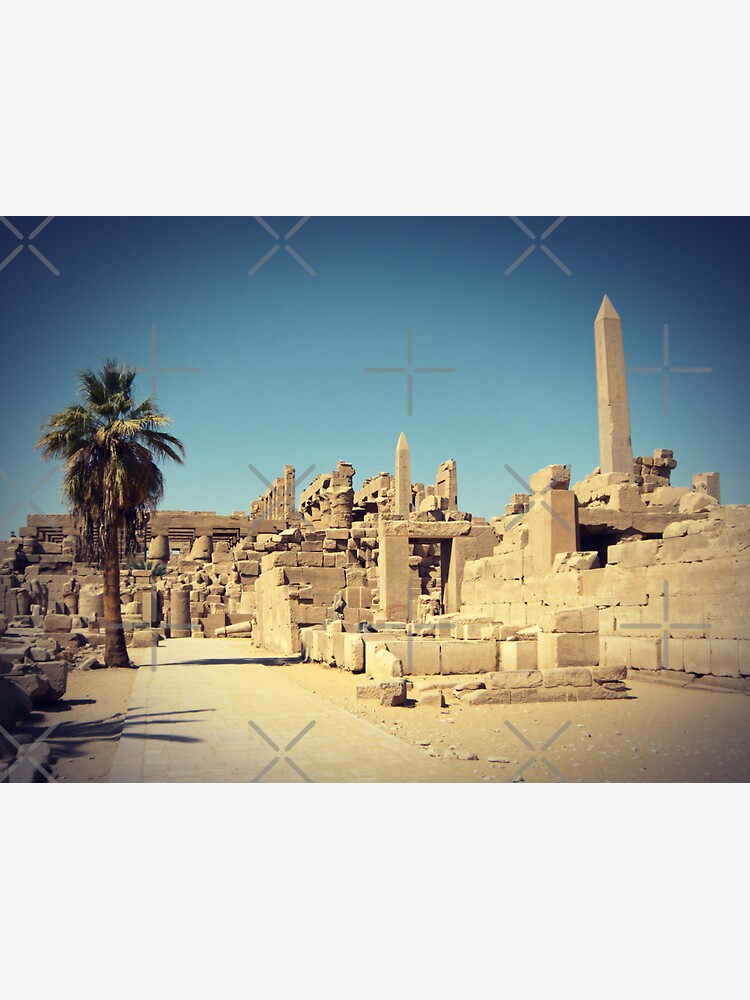 "Karnak temple in Luxor, rear view of the hypostyle hall, palm trees