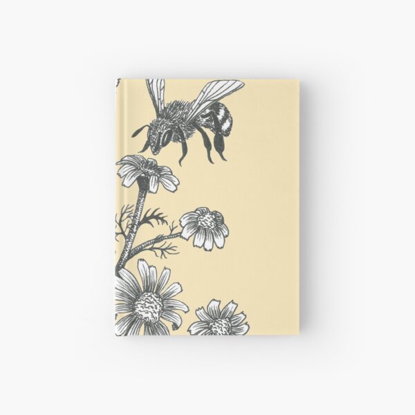 bees and chamomile on honey background Hardcover Journal