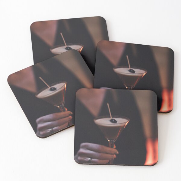 Item preview, a woman's hand holding an espresso martini in a moody bar photo designed and sold by xostarboyxo.