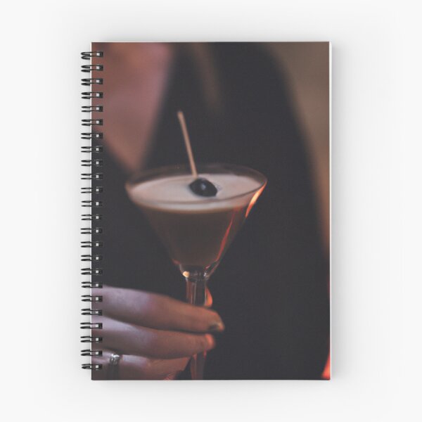 Item preview, a woman's hand holding an espresso martini in a moody bar photo designed and sold by xostarboyxo.