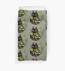 Black cat with flowers Duvet Cover