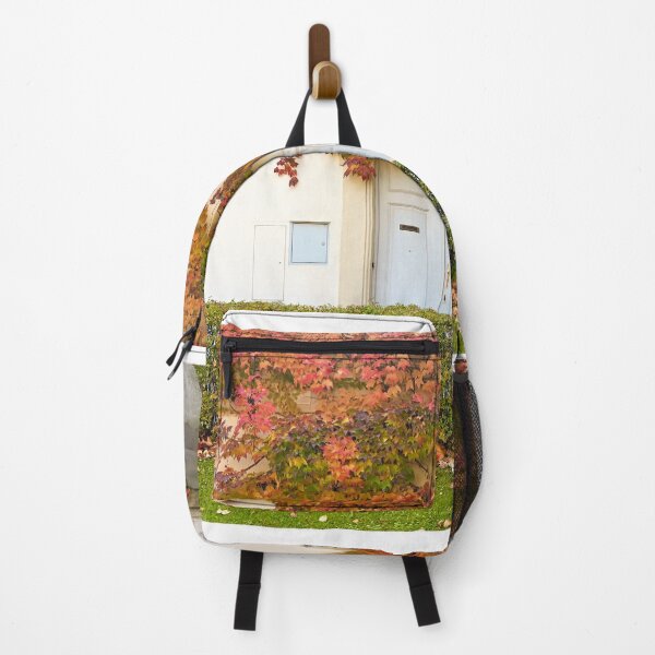 Item preview, the wall of an old house covered with colorful creeper leafs autumn season designed and sold by goceris.