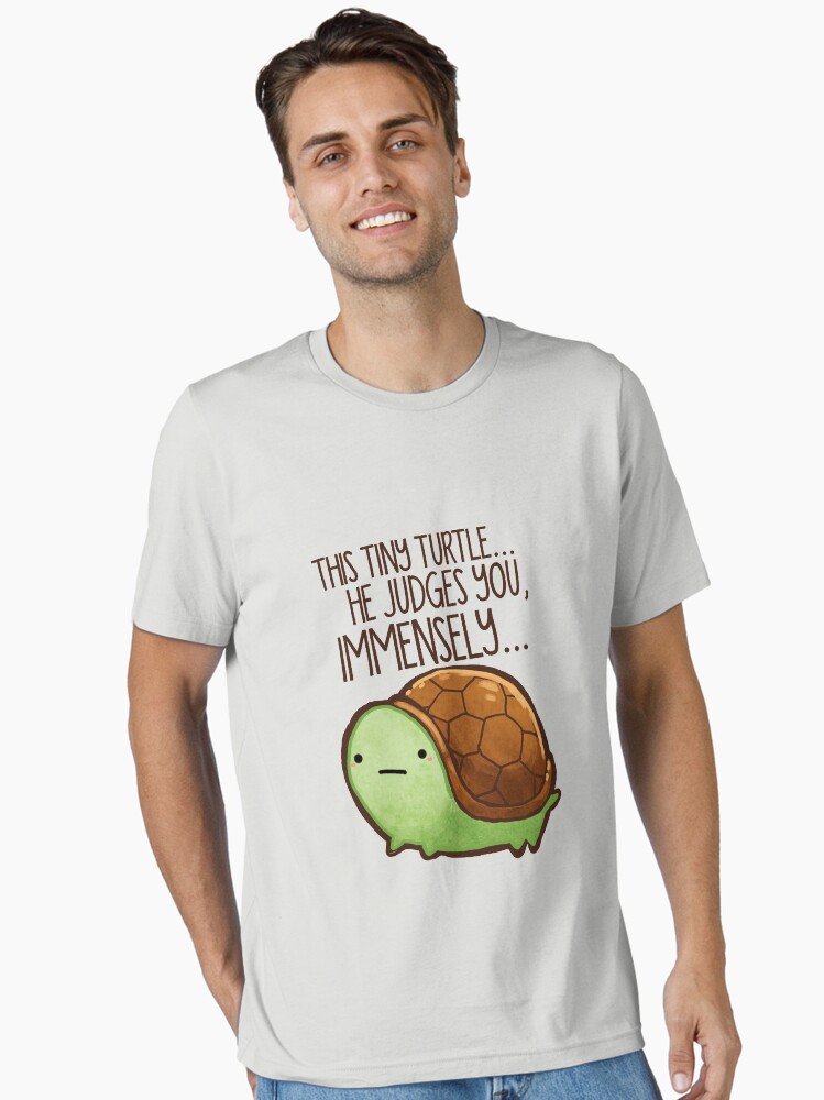 Thumbnail 1 of 7, Essential T-Shirt, This turtle.. he judges you. designed and sold by michelledraws.