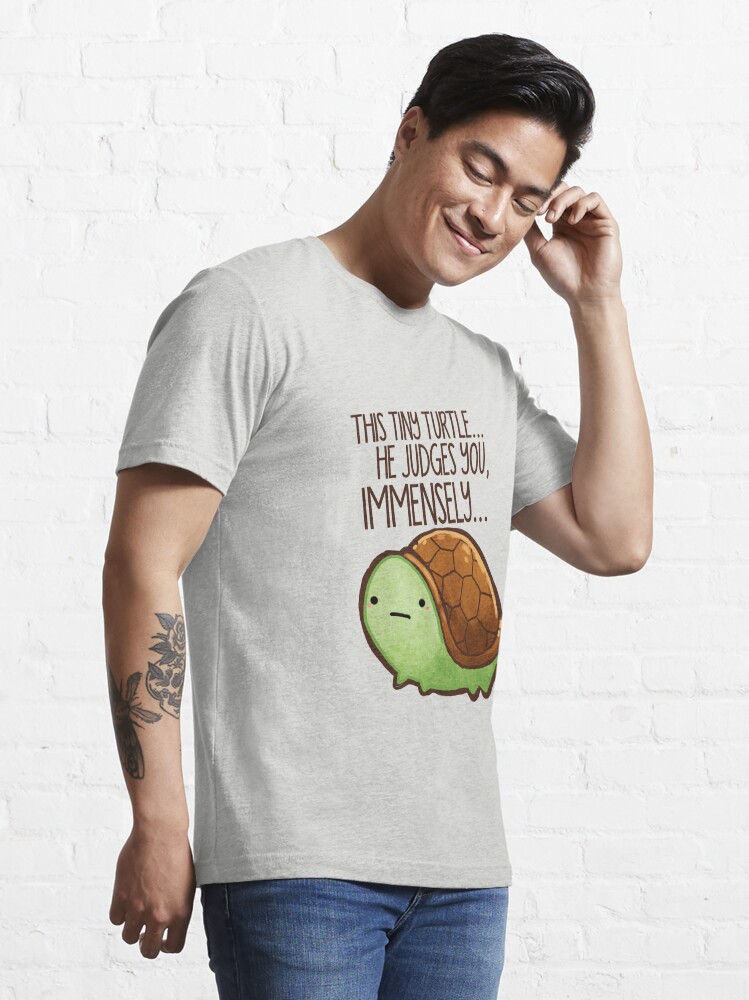 Thumbnail 3 of 7, Essential T-Shirt, This turtle.. he judges you. designed and sold by michelledraws.