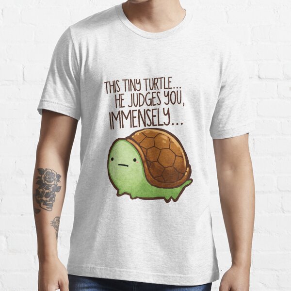 This turtle.. he judges you. Essential T-Shirt