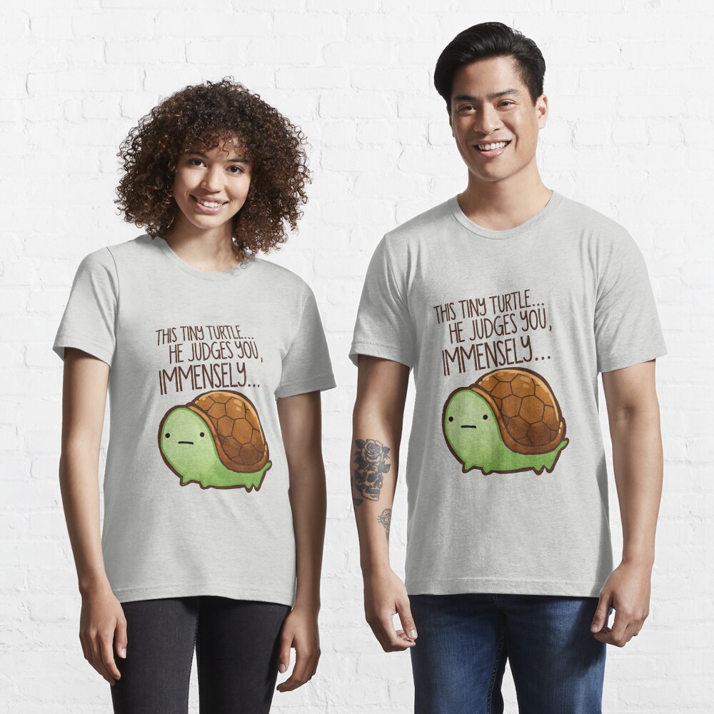 This turtle.. he judges you. Essential T-Shirt