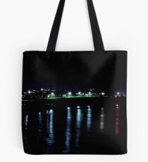 night lights on the ocean Tote Bag