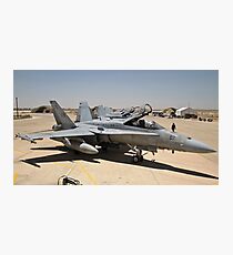 A row of U.S. Marine Corps F-18 Hornets await post-flight maintenance. Photographic Print
