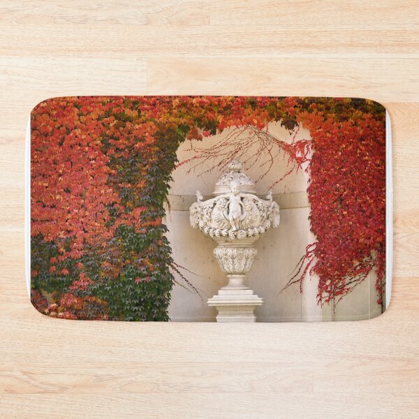 Item preview, old stone statue and wall with creeper plant in autumn Vienna Austria designed and sold by goceris.