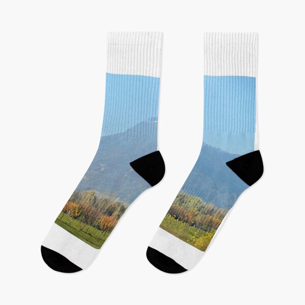 Item preview, a man rides a bicycle near Leopoldsberg in Vienna autumn season  designed and sold by goceris.