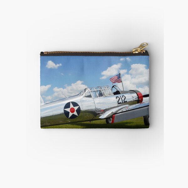 Item preview, STK105461M-A BT-13 Valiant trainer aircraft with American Flag. designed and sold by StocktrekImages.