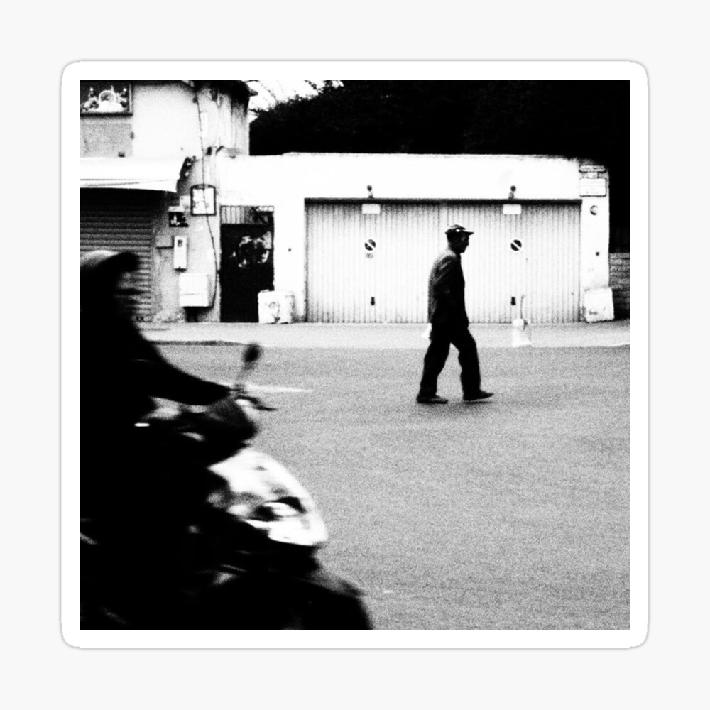 Old man walking near board with posters on street · Free Stock Photo