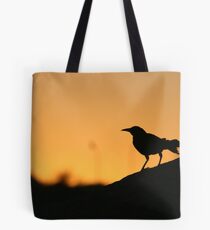 Grackle in the sunset Tote Bag
