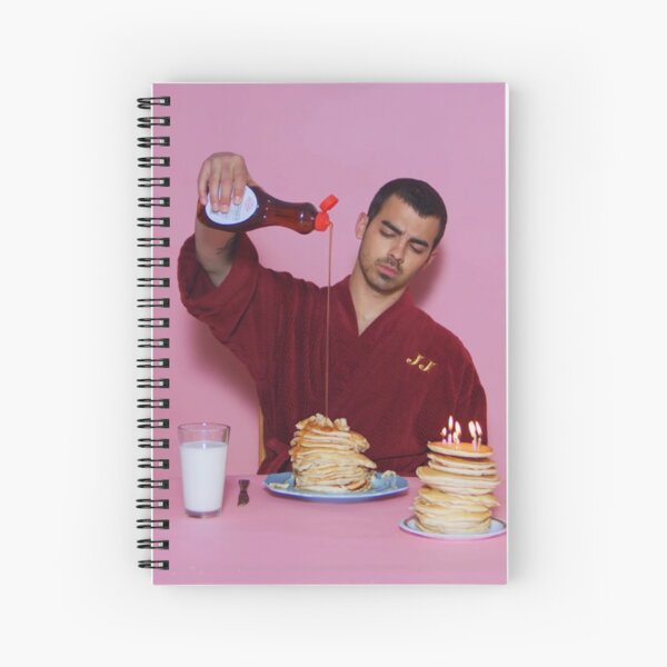 Joe Jonas pouring syrup over some pancakes SQUARE! Spiral Notebook