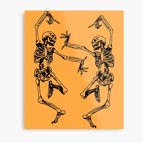 Dancing skeleton tattoo located on the bicep