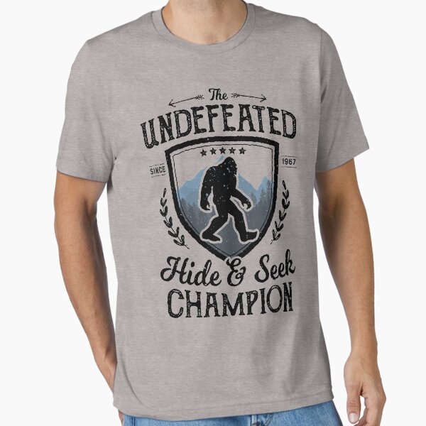 Item preview, Bigfoot Undefeated Hide and Seek Champion Sasquatch T Shirt designed and sold by LiqueGifts.