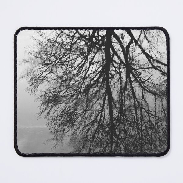 Item preview, Bare tree reflection in still water lake designed and sold by CarolinaReina.