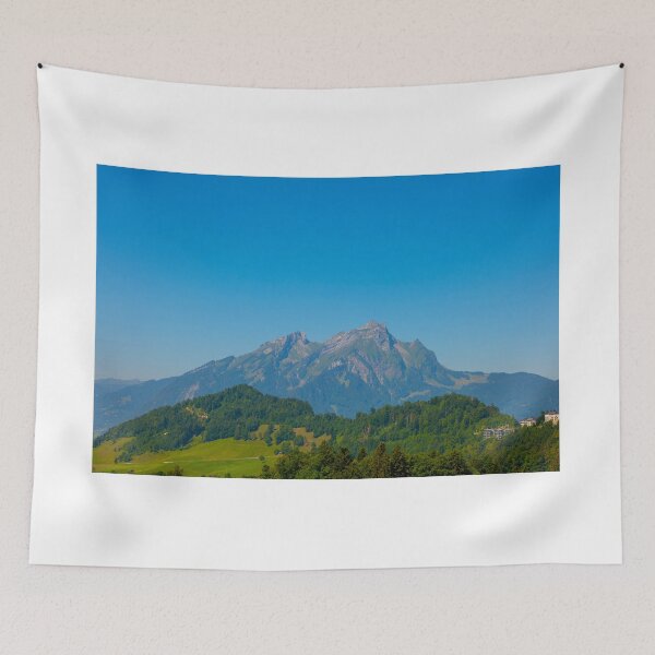 Item preview, Aerial View over Mountain Peak Pilatus and Hotel with Clear Blue Sky designed and sold by Mats Silvan.