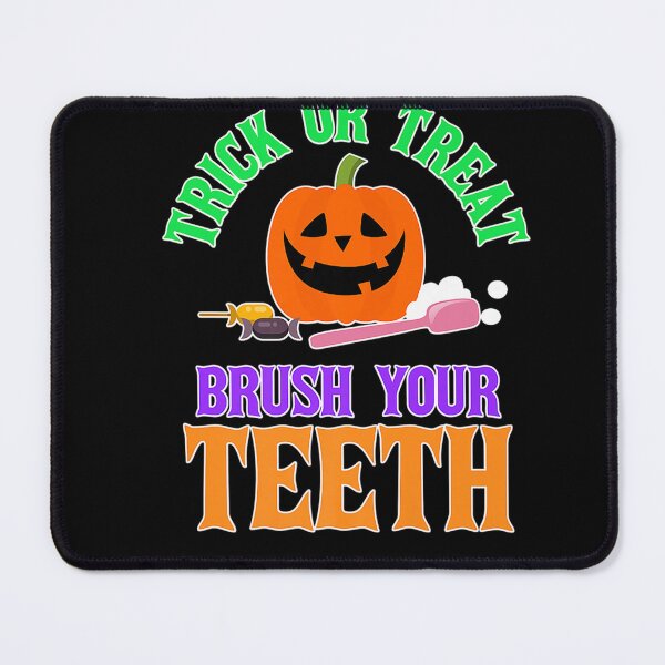 Item preview, TRICK OR TREAT Brush Your Teeth Halloween Dentist T-Shirt designed and sold by DahnkeBinney.