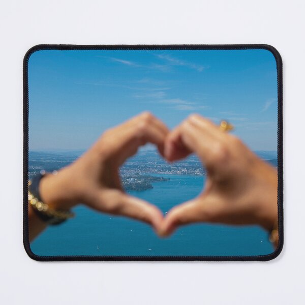 Item preview, Woman Making a Heart Shape with Her Hands with View over City and Lake Lucerne designed and sold by Mats Silvan.