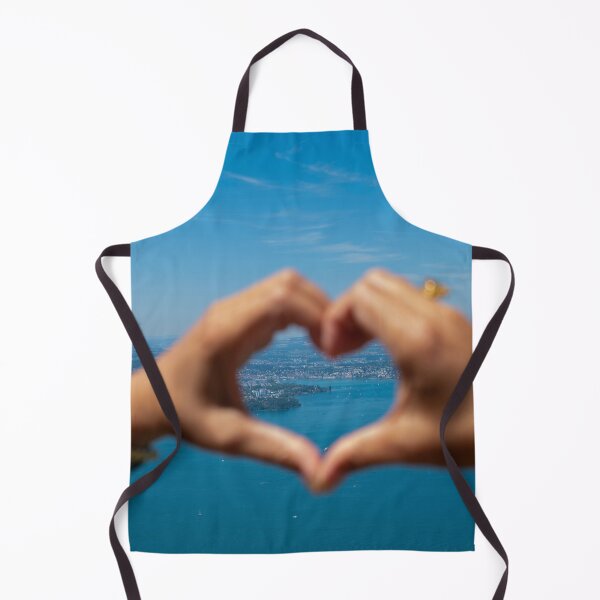 Item preview, Woman Making a Heart Shape with Her Hands with View over City and Lake Lucerne designed and sold by Mats Silvan.