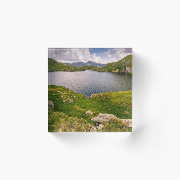 lake in mountains with grass on hillside Acrylic Block