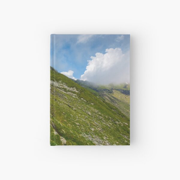 Steep slope on rocky hillside in clouds Hardcover Journal