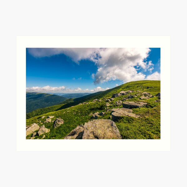 blue cloudy sky over the mountains with rocky hillside Art Print