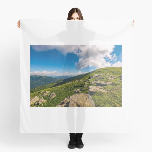 blue cloudy sky over the mountains with rocky hillside Scarf