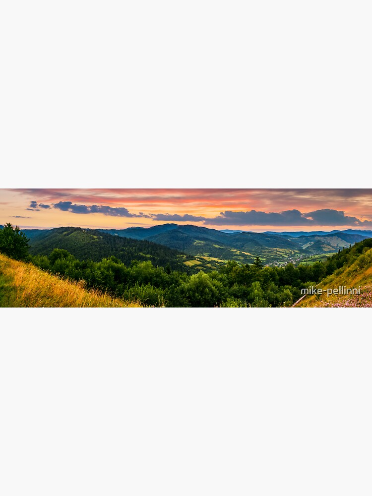 panorama of mountain ridge with peak at sunset by mike-pellinni