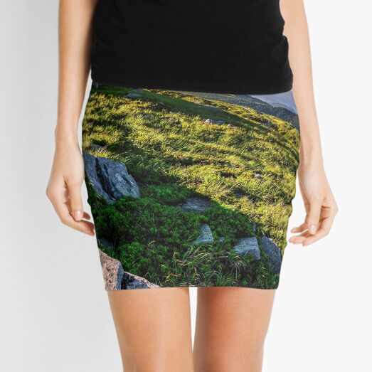 hillside with boulders in Carpathian mountains in summer Mini Skirt