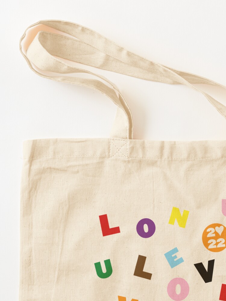 Outlets love on tour tote bag