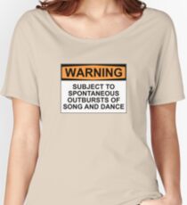 WARNING: SUBJECT TO SPONTANEOUS OUTBURSTS OF SONG AND DANCE Women's Relaxed Fit T-Shirt