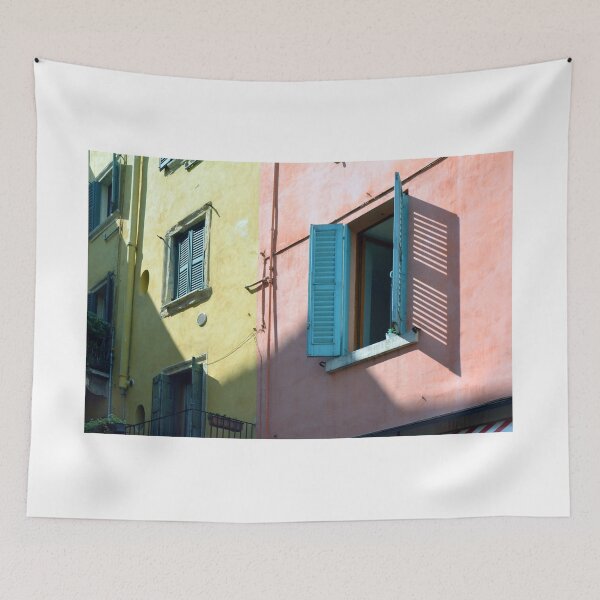 Item preview, Close up on window with blue shutters on Italian building facade  designed and sold by oanaunciuleanu.