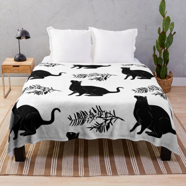 The black cat and the yew Throw Blanket