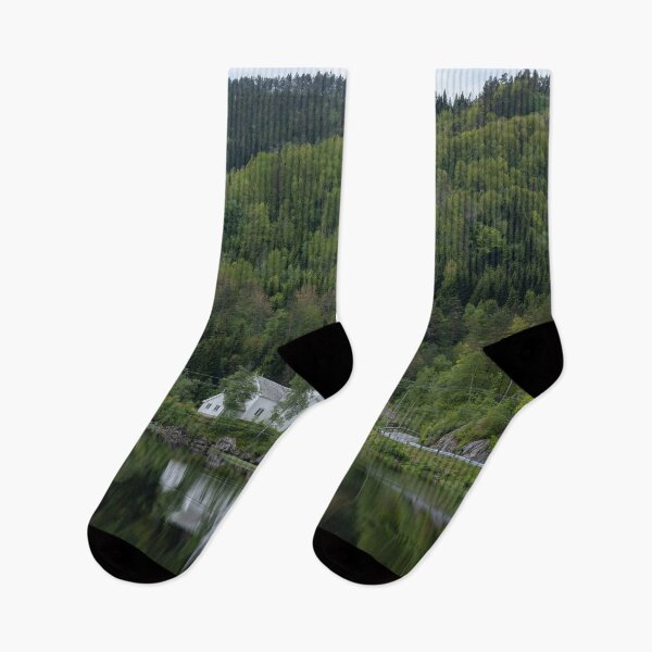 Item preview, Wonderful landscapes in Norway. Vest-Agder. Beautiful scenery of whtite Gyland church reflecting in the lake. Mountains, road and trees in the background designed and sold by Maurizio Fabbroni.