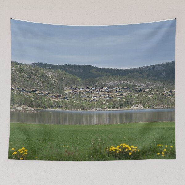 Item preview, Wonderful landscapes in Norway. Vestland. Beautiful scenery of wooden cabins with grass on the roof, reflecting in the lake in a sunny summer day. Yellow flowers in foreground designed and sold by Maurizio Fabbroni.