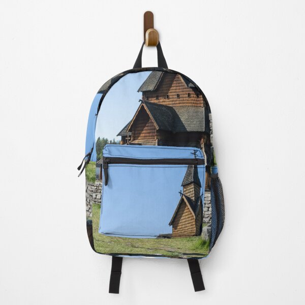 Item preview, Medieval graveyard and Heddal wooden stave church. Heddal Stavkirke, 13th century. Largest stave church in Norway. Sunny spring day (vertical) designed and sold by Maurizio Fabbroni.