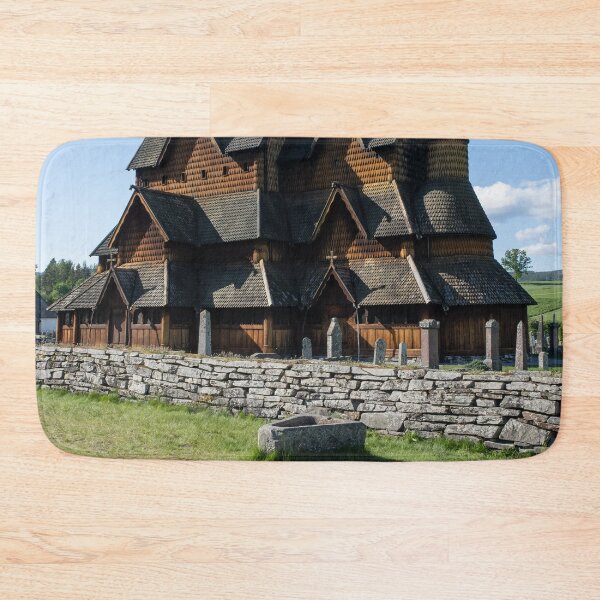 Item preview, Medieval graveyard and Heddal wooden stave church. Heddal Stavkirke, 13th century. Largest stave church in Norway. Sunny spring day (vertical) designed and sold by Maurizio Fabbroni.